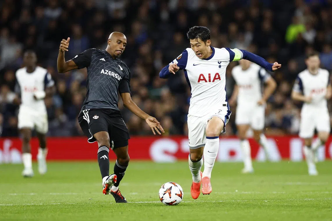 The father of Tottenham Hotspur's Son Heung-min (right) has been ordered to pay a fine for violating child welfare law at his football school.