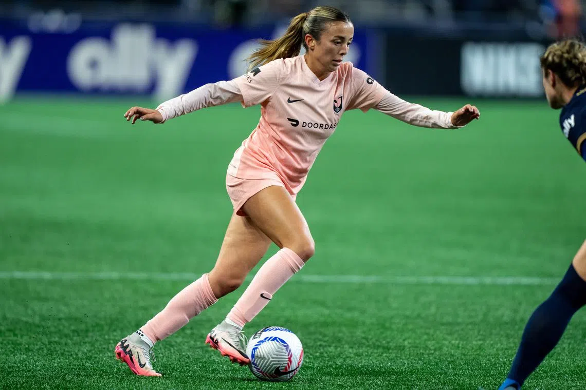 FILE PHOTO: Oct 4, 2024; Seattle, Washington, USA;  Angel City FC defender Madison Curry (27) dribbles the ball against the Seattle Reign at Lumen Field. Stephen Brashear-Imagn Images/File Photo