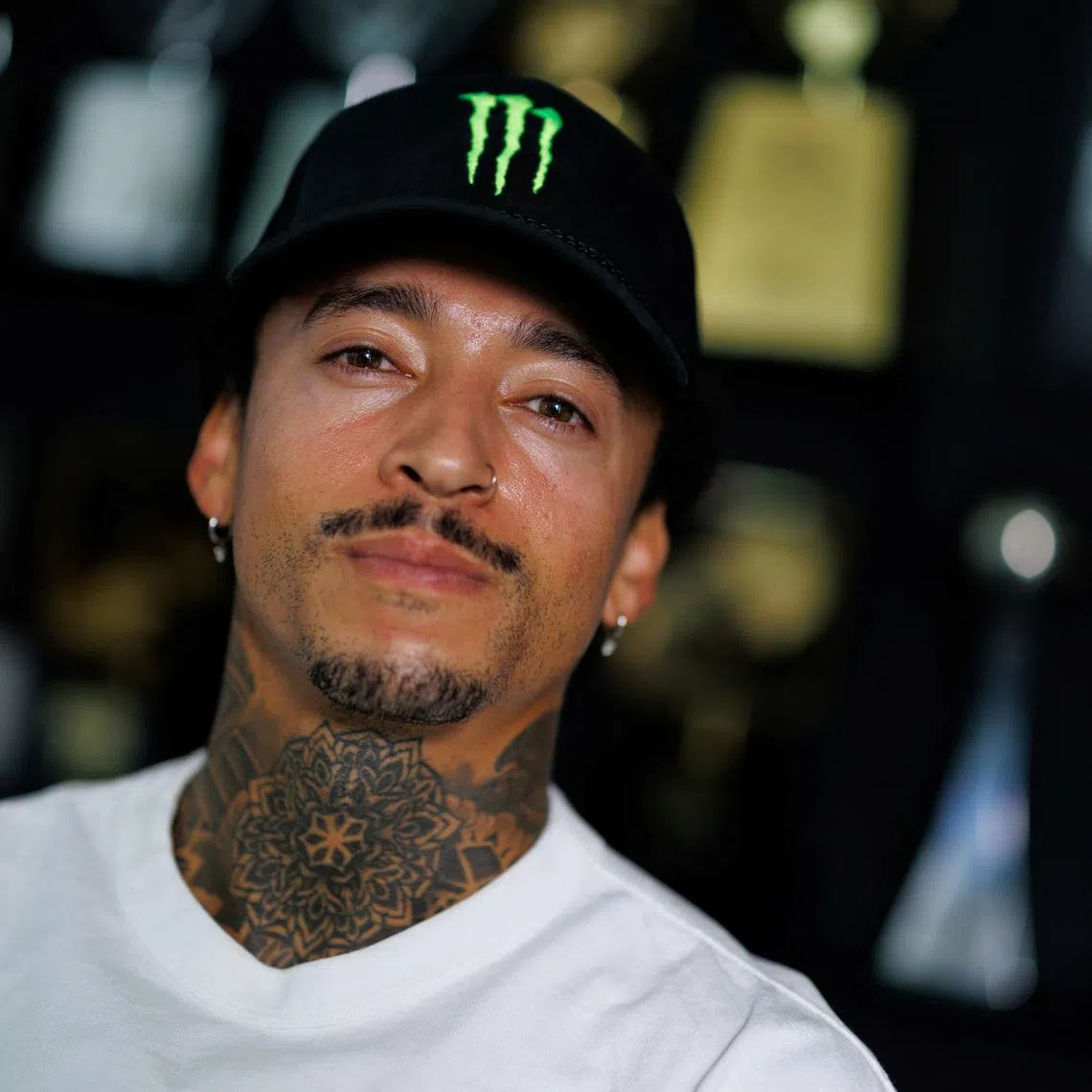 FILE PHOTO: Professional skateboarder Nyjah Huston poses for a portrait at his home in Laguna Beach, California, U.S. July 30, 2025. REUTERS/Mike Blake/File Photo