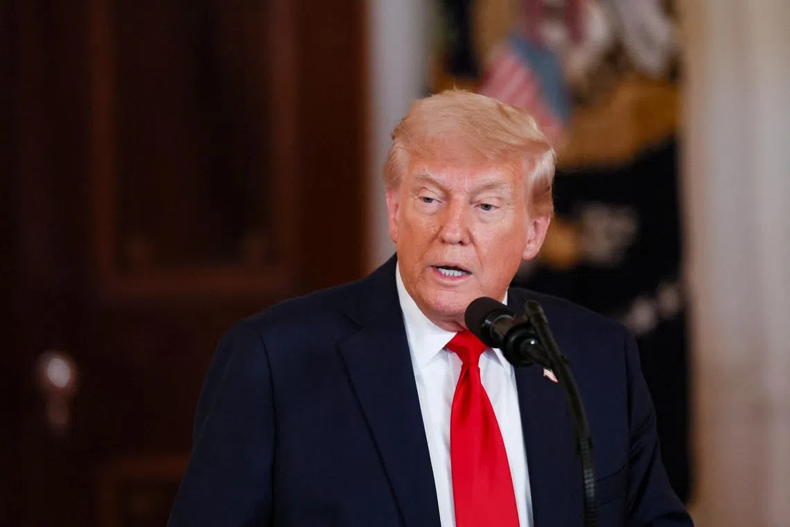 U.S. President Donald Trump delivers remarks at an 'Investing in America' event in Washington, D.C., U.S., April 30, 2025. REUTERS/Leah Millis