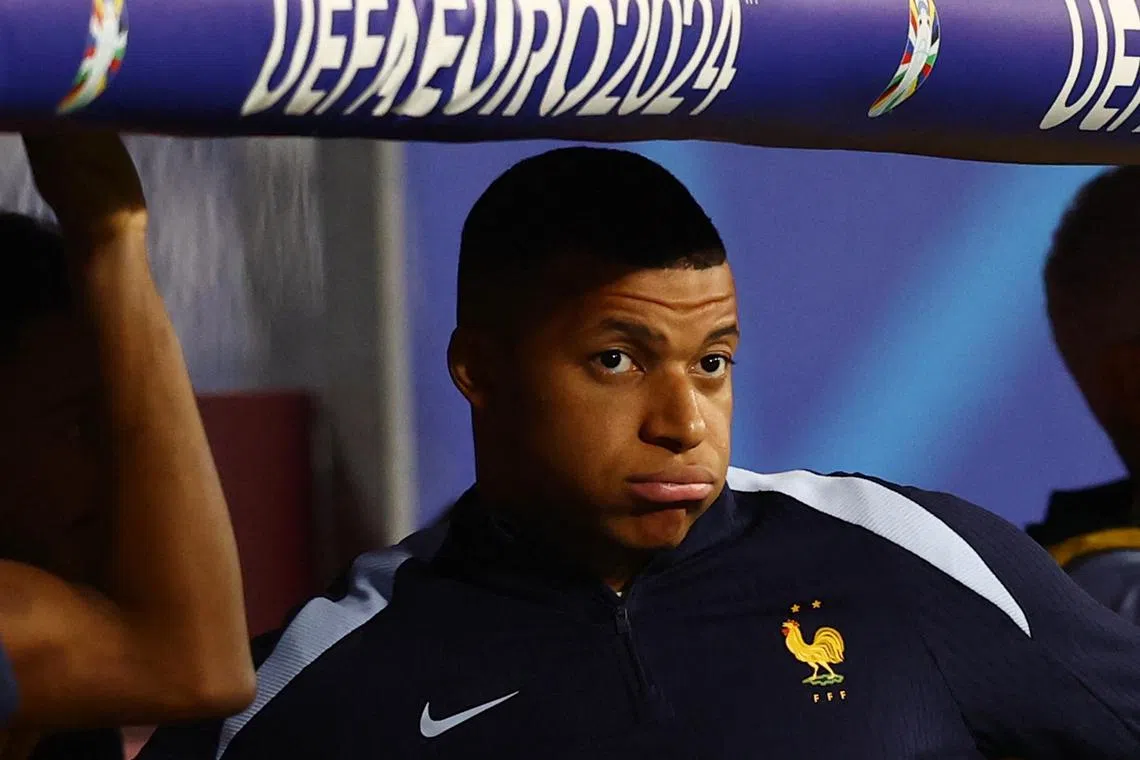 FILE PHOTO: Soccer Football - Euro 2024 - Group D - Netherlands v France - Leipzig Stadium, Leipzig, Germany - June 21, 2024  France's Kylian Mbappe reacts after the match REUTERS/Kai Pfaffenbach/File Photo