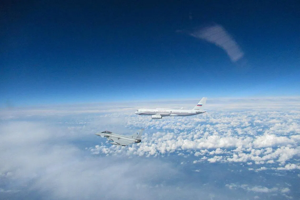 FILE PHOTO: Two Royal Air Force (RAF) Typhoons from 1 (fighter) Squadron were scrambled to intercept a Russian Tu-214 aircraft. The Typhoons are deployed in Estonia as part of NATO's Baltic Air Policing mission OP AZOTIZE, July 4, 2023. UK MOD Crown copyright 2023/Handout via REUTERS/File Photo