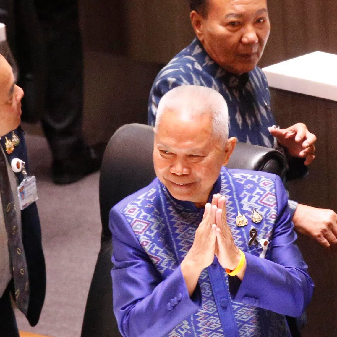 Mr Sophon Saram (right) received 289 votes, compared with the 123 for the opposition People’s Party candidate.   