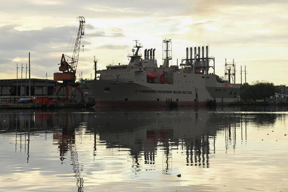 FILE PHOTO: A floating power plant is docked on Havana Bay, after U.S. President Donald Trump vowed to stop Venezuelan oil and money from reaching the island as Cubans brace for worsening fuel shortages amid regular power outages, in Havana, Cuba January 12, 2026. REUTERS/Norlys Perez/File Photo