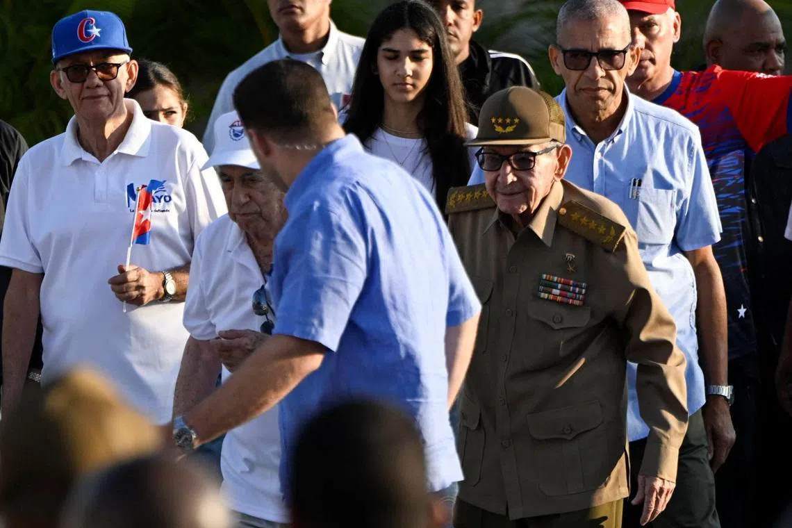 Cuba's Raul Castro joins May Day march as tensions simmer with US