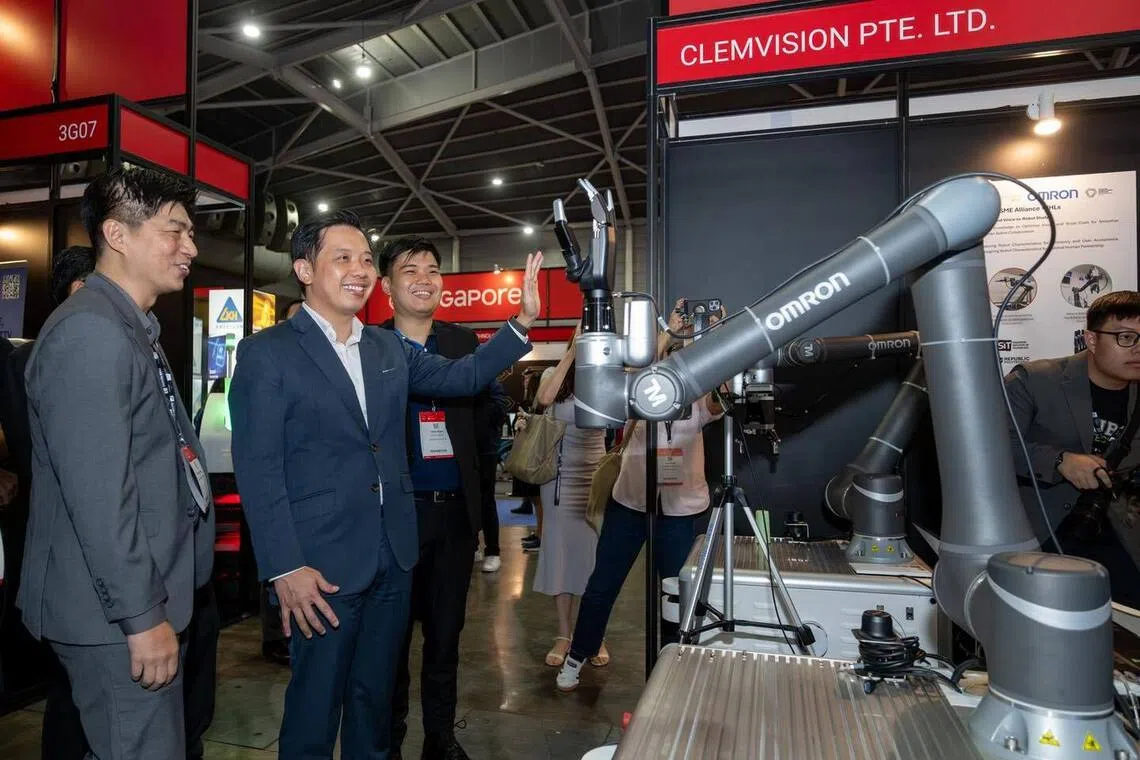 Minister of State for Trade and Industry Alvin Tan (2nd from left) at the Industrial Transformation Asia-Pacific 2025.