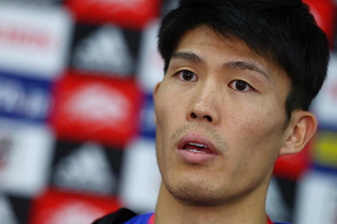 FILE PHOTO: Soccer Football - FIFA World Cup Qatar 2022 - Japan Training - Al Sadd SC New Training Facilities 1, Doha, Qatar - November 26, 2022 Japan's Takehiro Tomiyasu speaks to the media after training REUTERS/Bernadett Szabo/File Photo