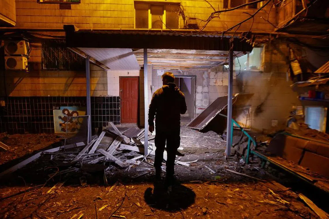 A view shows an entrance of a multi-storey residential building damaged in recent shelling in the course of Russia-Ukraine conflict in Donetsk, Russian-controlled Ukraine, October 26, 2023. REUTERS/Alexander Ermochenko