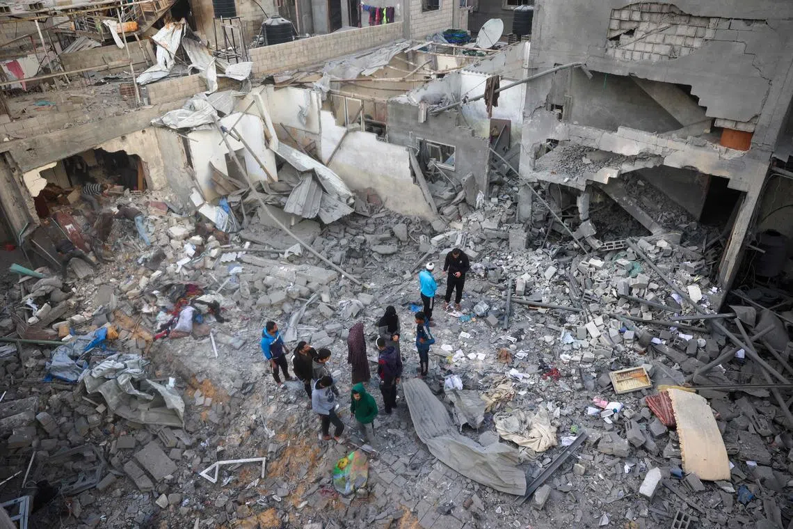 Homes reduced to rubble at the Nuseirat refugee camp by an Israeli attack on March 18, after Israel unleashed its most intense strikes on the Gaza Strip since a January ceasefire.