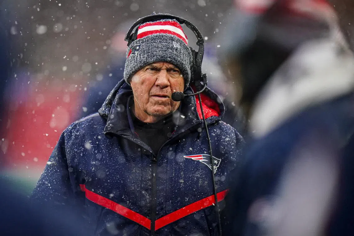 FILE PHOTO: Jan 7, 2024; Foxborough, Massachusetts, USA; New England Patriots head coach Bill Belichick watches from the sideline as they take on the New York Jets at Gillette Stadium. Mandatory Credit: David Butler II-USA TODAY Sports/File Photo
