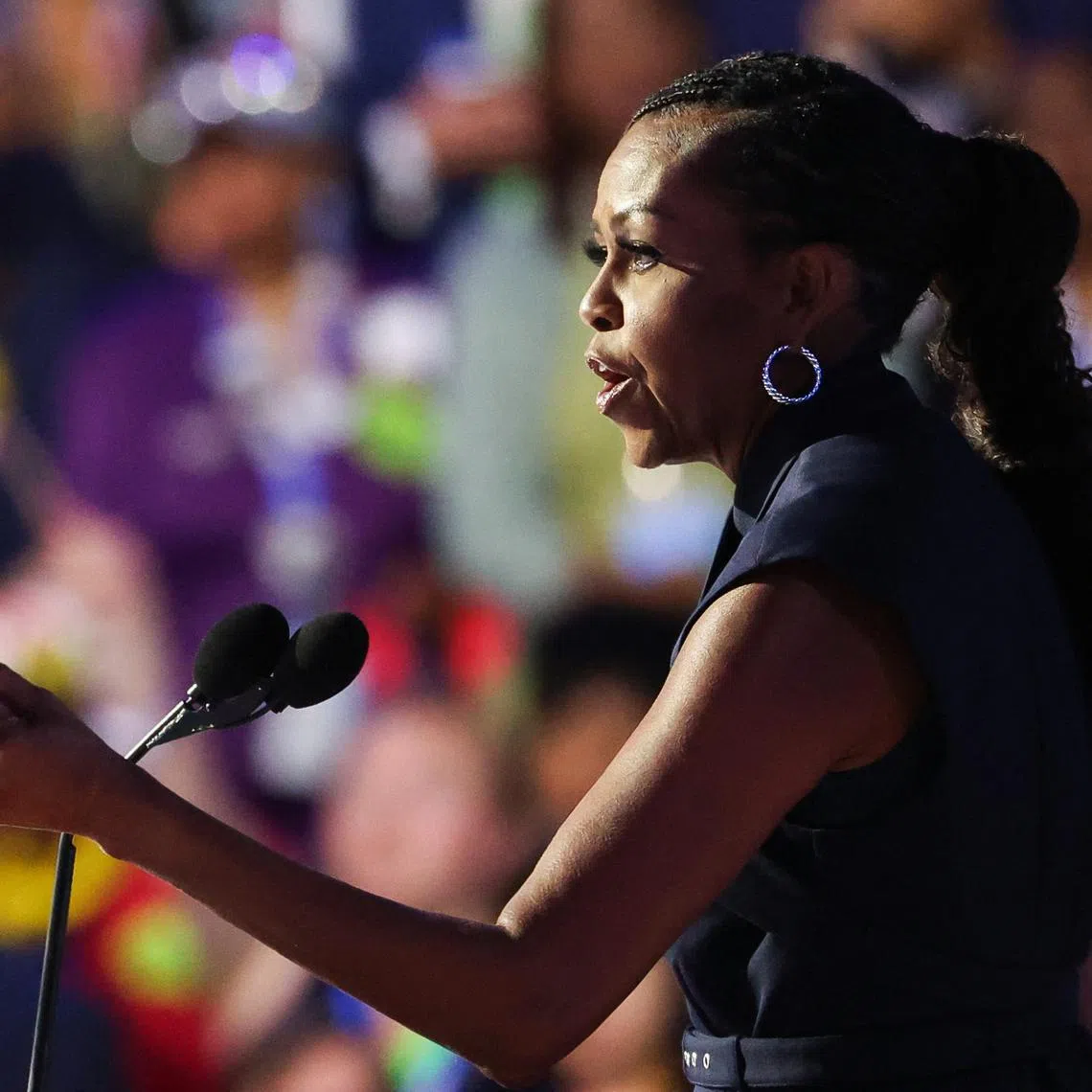 Former first lady of the United States Michelle Obama speaks during Day 2 of the Democratic National Convention (DNC) in Chicago, Illinois, U.S., August 20, 2024. REUTERS/Brendan Mcdermid