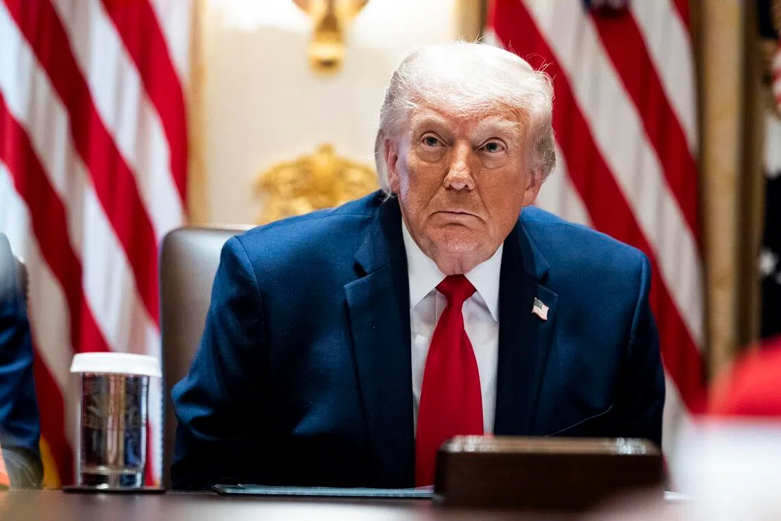 US President Donald Trump makes remarks during a meeting with his Cabinet in the Cabinet Room of the White House in Washington on May 27.