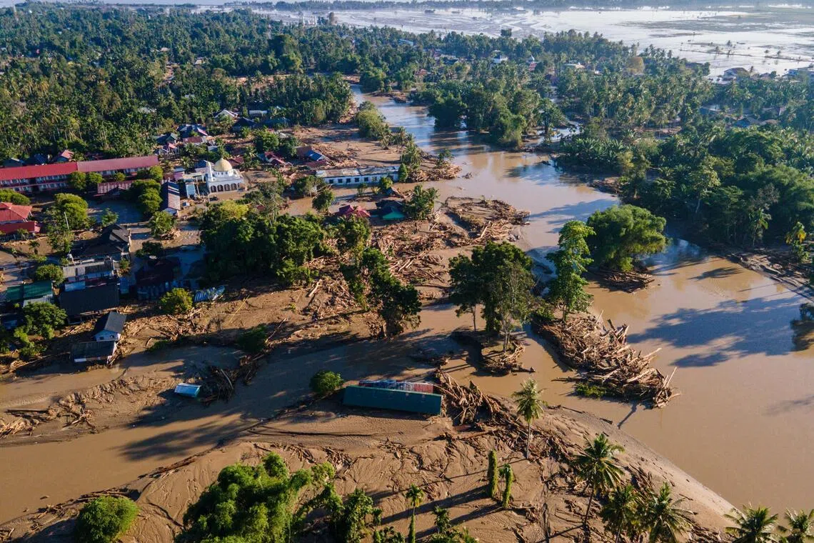 Flood damage in Meureudu, Pidie Jaya district in Indonesia's Aceh province on Nov 30.