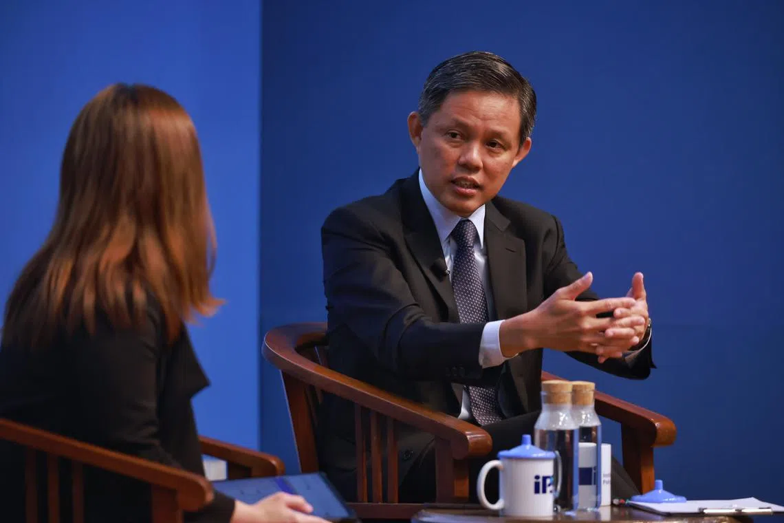 Education minister Chan Chun Sing (right) speaks during a Q&A session at the Institute of Policy Studies, on Jan 5, 2023.