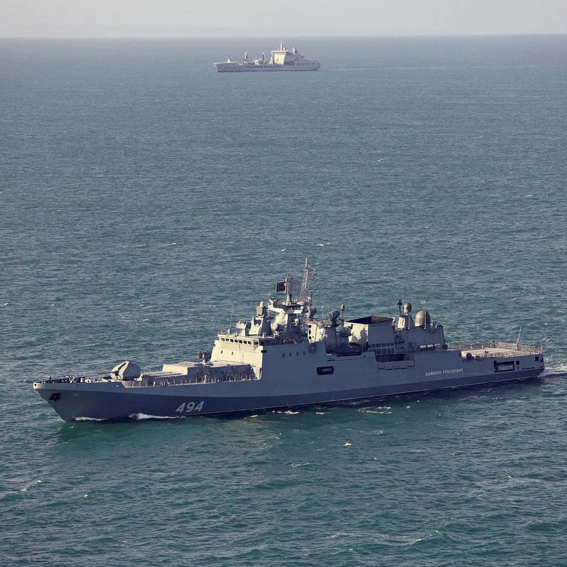 RFA Tideforce, as seen in the background, monitors the Russian frigate Admiral Grigorovich in an unknown location in this handout image dated June 4, 2026.