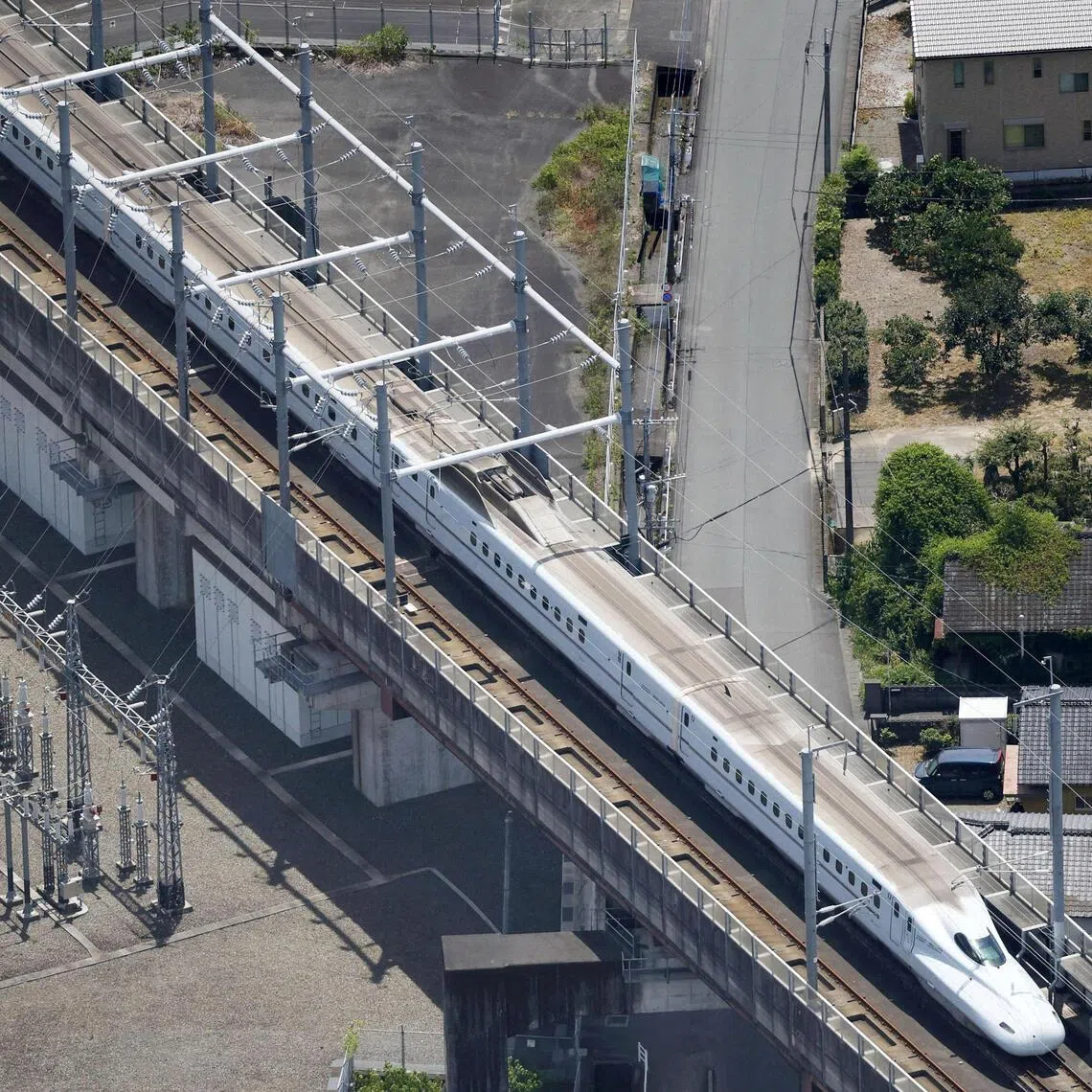 According to JR Kyushu, the suspended section suffered major damage, including deformed tracks and broken utility poles.