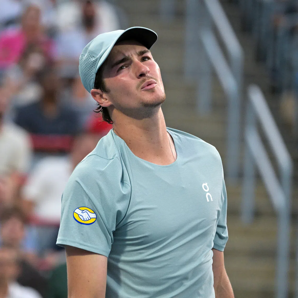 Aug 9, 2026; Montreal, QC, Canada; Joao Fonseca (BRA) reacts after losing a point against Ben Shelton (USA) during round of sixteen play at IGA Stadium. Mandatory Credit: Eric Bolte-Imagn Images