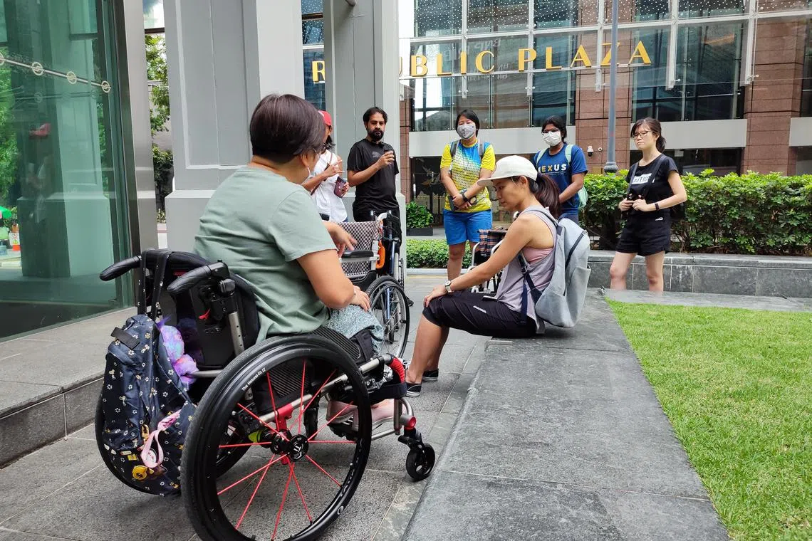 Volunteers attending a Wheel the Ground session organised by SmartBFA to collect data on barrier-free and accessible paths for wheelchair users around Singapore.