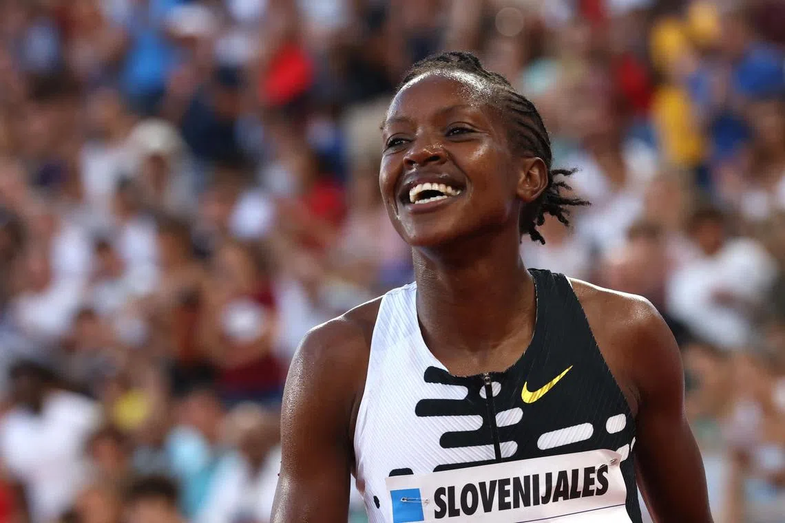 Kenya's Faith Kipyegon celebrates after winning the women's one mile final in record time.