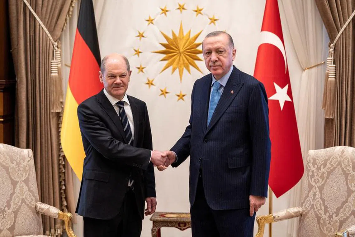 FILE PHOTO: German Chancellor Olaf Scholz meets with Turkey's President Recep Tayyip Erdogan in Ankara, Turkey, March 14, 2022.   Guido Bergmann/BPA/Handout via REUTERS/File Photo