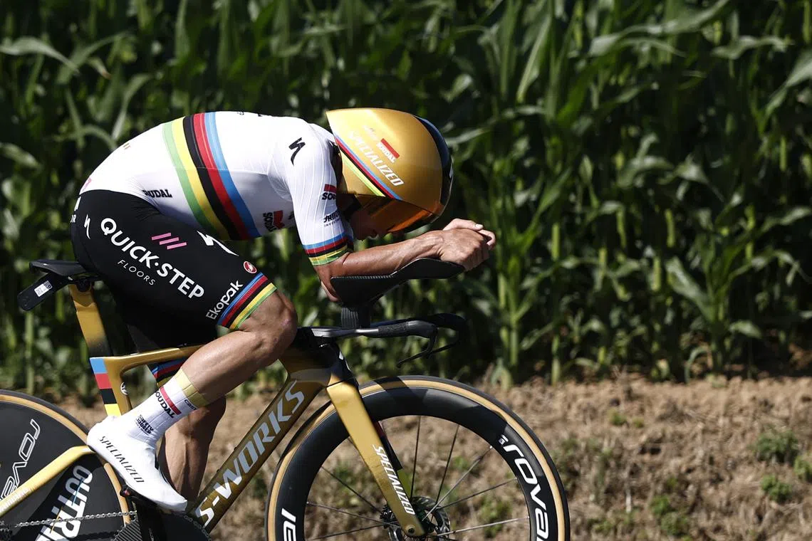 Cycling - Tour de France - Stage 5 - Caen to Caen - Caen, France - July 9, 2025 Soudal Quick-Step's Remco Evenepoel in action during the stage 5 time trial REUTERS/Benoit Tessier
