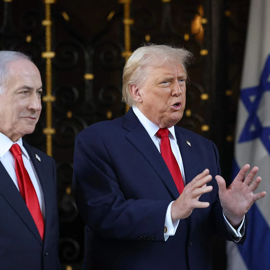 US President Donald Trump (right) speaking  to the media on Dec 29 in Florida, as Israeli Prime Minister Benjamin Netanyahu arrives to visit Mr Trump's Mar-a-Lago club for talks on Gaza.