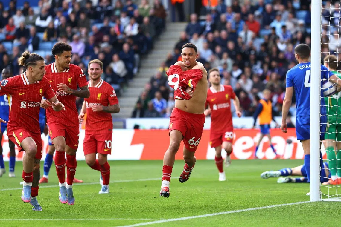 Soccer Football - Premier League - Leicester City v Liverpool - King Power Stadium, Leicester, Britain - April 20, 2025 Liverpool's Trent Alexander-Arnold celebrates scoring their first goal with Liverpool's Kostas Tsimikas and Liverpool's Luis Diaz Action Images via Reuters/Andrew Boyers