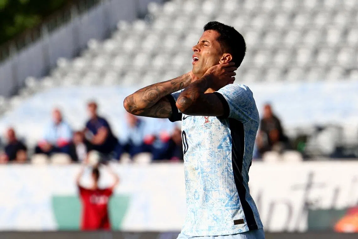 FILE PHOTO: Soccer Football - International Friendly - Portugal v Croatia - Centro Desportivo Nacional do Jamor, Oeiras, Portugal - June 8, 2024 Portugal's Joao Cancelo reacts after he misses a chance to score REUTERS/Pedro Nunes/File Photo