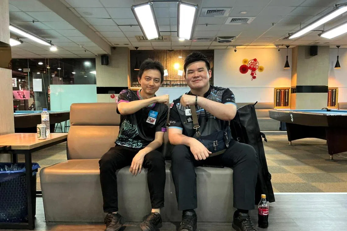 Singapore's Aloysius Yapp (right) continues his winning streak by beating Taiwanese Ko Ping-chung in the Formosa Cup Taipei Pool Open final.