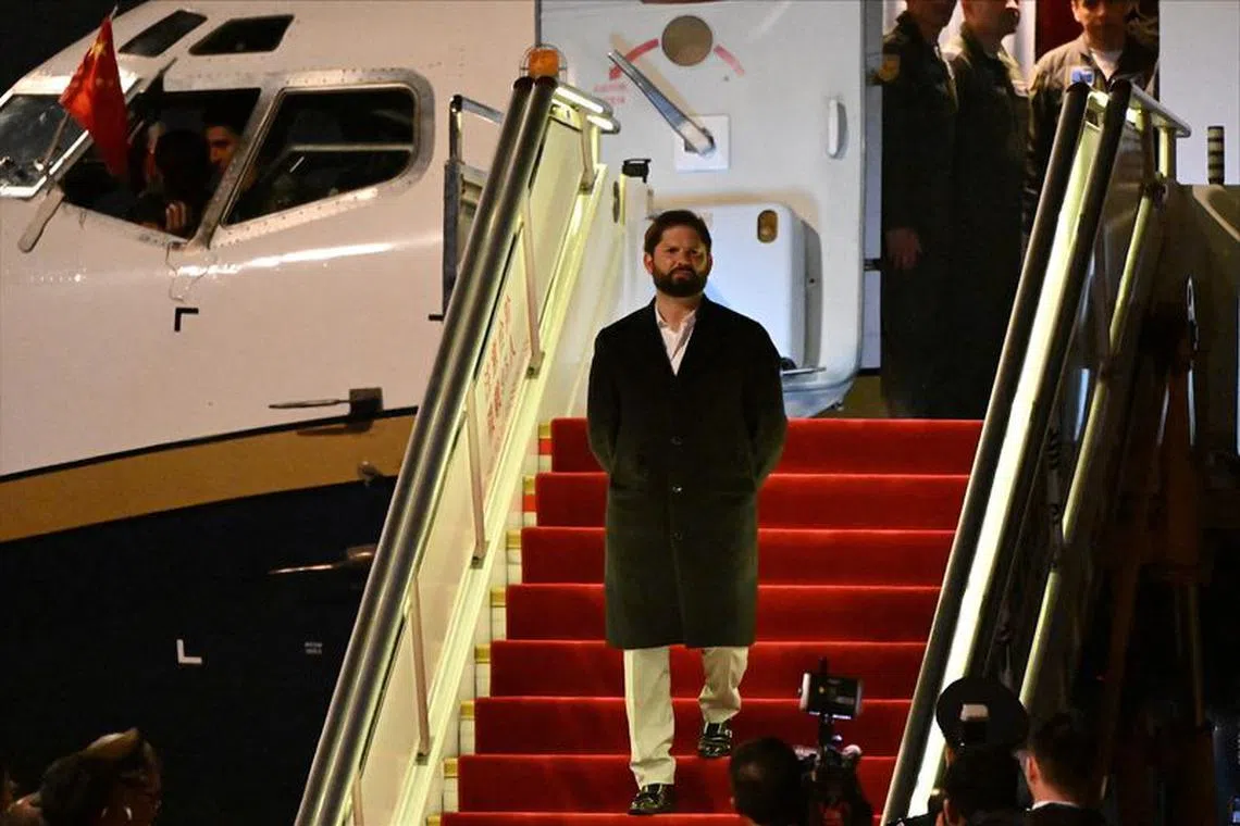Chilean President Gabriel Boric arrives at Beijing Capital International Airport to attend the Third Belt and Road Forum in Beijing, China, October 15, 2023. Jade Gao/Pool via REUTERS