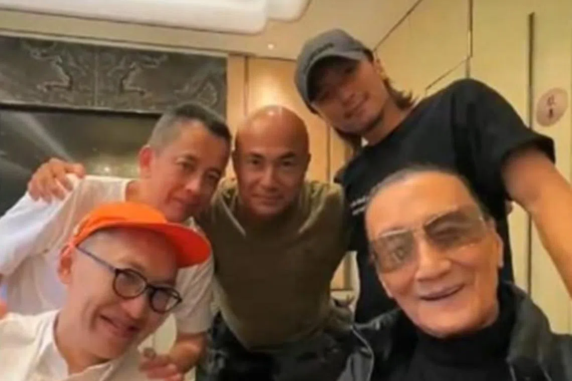 Patrick Tse (front, right) with his son Nicholas Tse (back, right), retired firefighter Sam Hui (back, middle) and other friends.