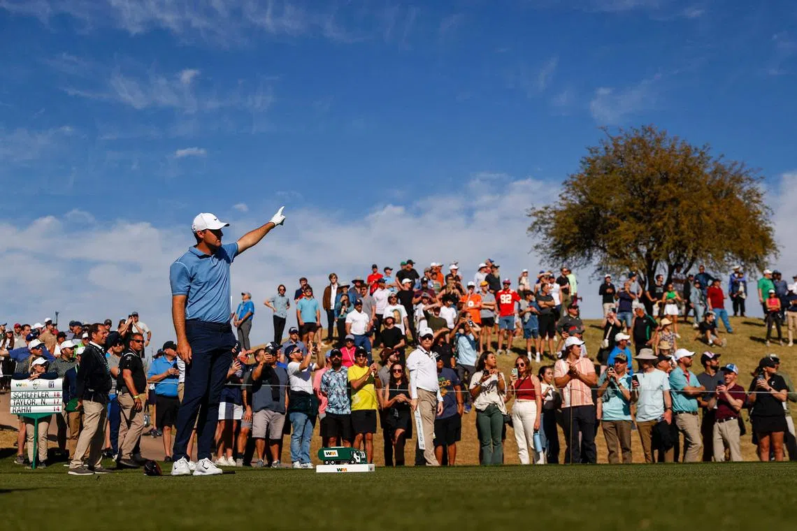 Scottie Scheffler reacting to his shot from the 14th tee during the final round of the Phoenix Open in Arizona, United States.
