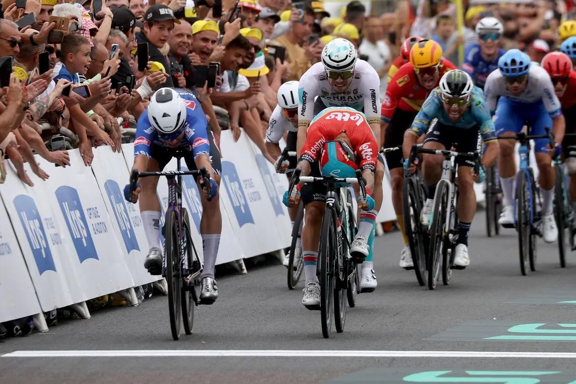 Belgian rider Jasper Philipsen (far left) of team Alpecin-Deceuninck beating Australian rider Caleb Ewan of team Lotto Dstny to win the 4th stage of the Tour de France 2023, a 181,8km race from Dax to Nogaro, France, on Tuesday.
