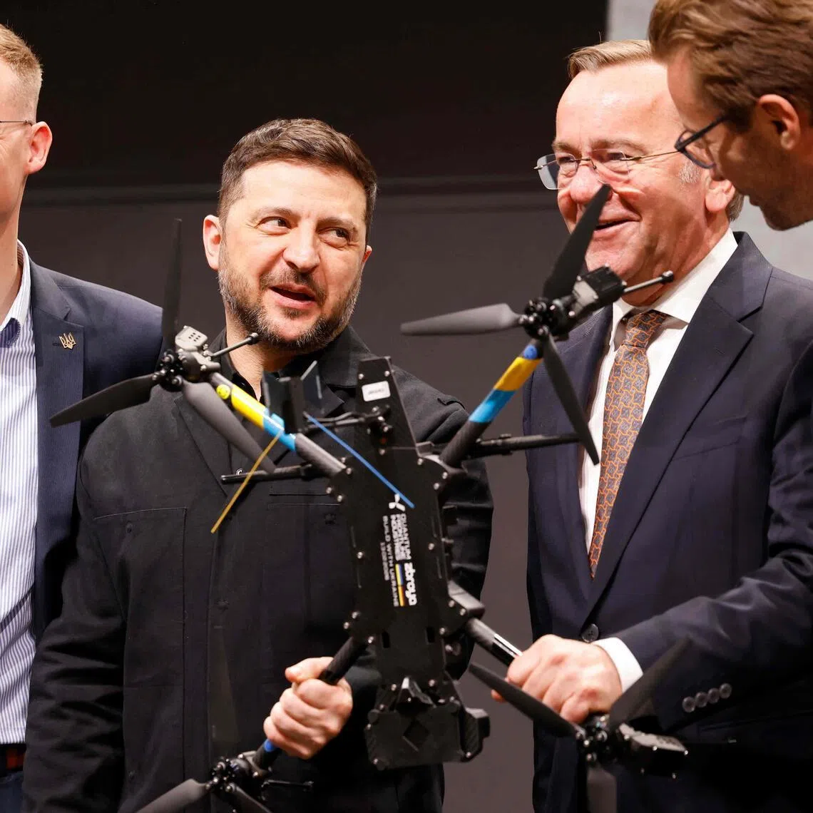 Ukrainian President Volodymyr Zelensky (centre left) and German Defence Minister Boris Pistorius (centre right) visiting the drone facility of Quantum Frontline Industries near Munich, Germany, on Feb 13.