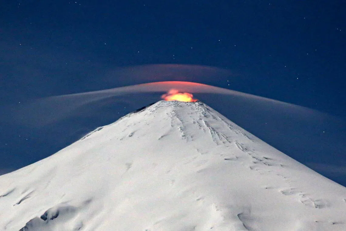 The Villarrica volcano as seen from Villarrica, some 800 kilometres south of Santiago, Chile, on Sept 27. Villarrica is among the most active volcanoes in South America..
