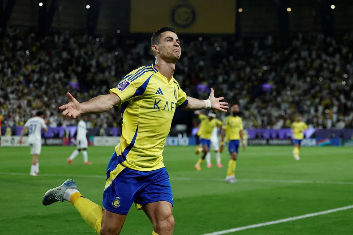 FILE PHOTO: Soccer Football - Asian Champions League - Round of 16 - Second Leg - Al Nassr v Esteghlal - Al Awwal Park, Riyadh, Saudi Arabia - March 10, 2025 Al Nassr's Cristiano Ronaldo celebrates scoring their second goal REUTERS/Hamad I Mohammed/File Photo