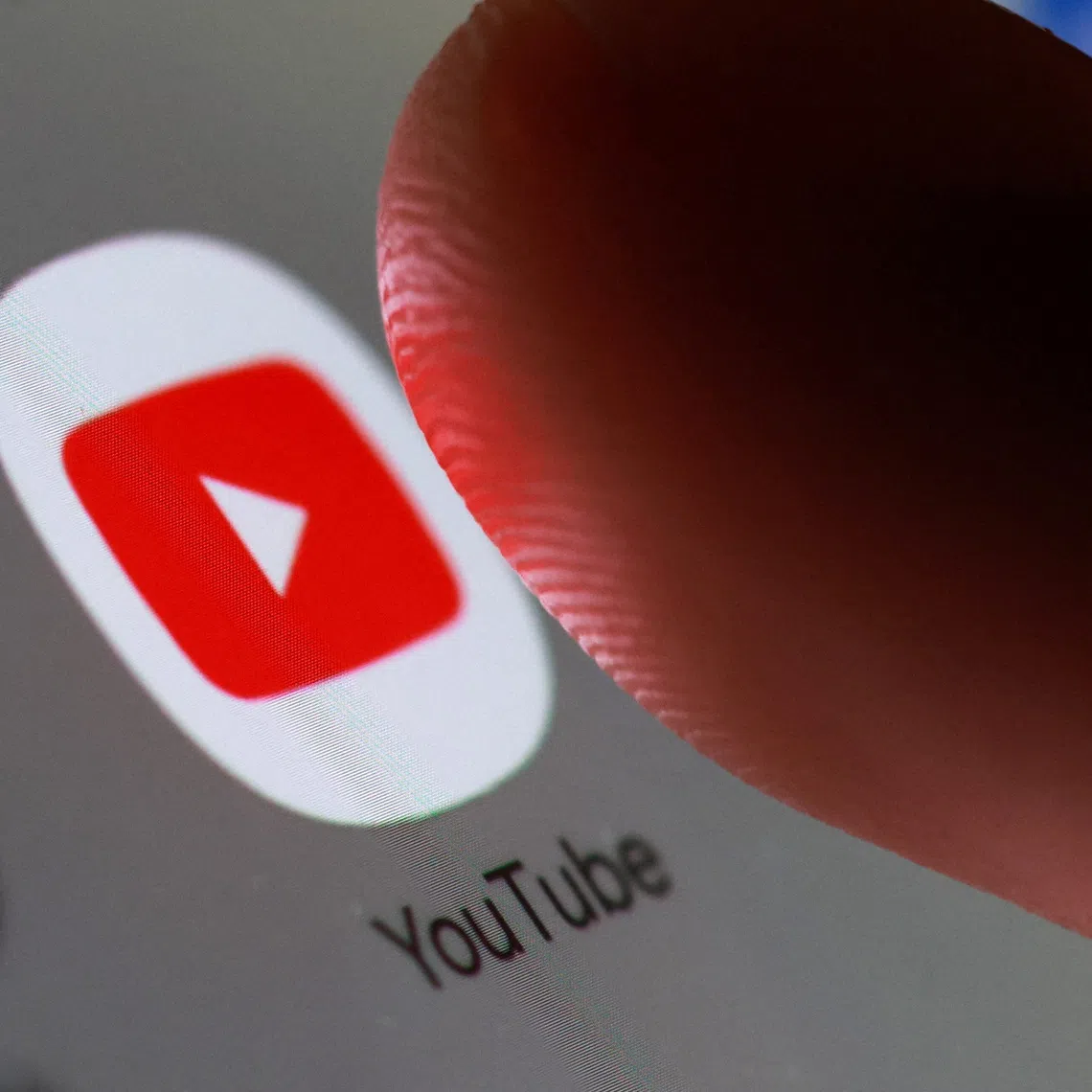 The YouTube app icon on a smartphone in this illustration taken October 27, 2025. REUTERS/Dado Ruvic/Illustration