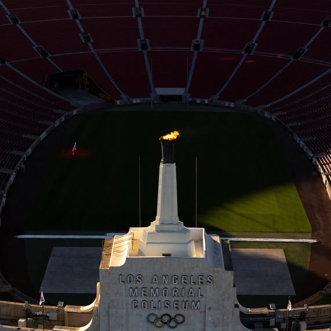 FILE PHOTO: Olympics - LA28 - Ceremonial lighting of the cauldron - LA Memorial Coliseum, Los Angeles, California, U.S. - January 13, 2026. Ceremonial lighting of the cauldron ahead of ticket registration launch. REUTERS/Daniel Cole/File Photo