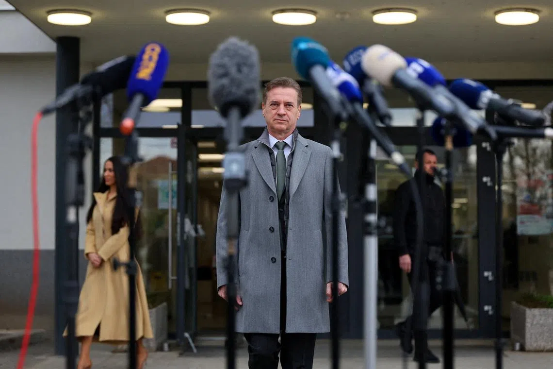 Slovenia's Prime Minister Robert Golob looks on after voting at a polling station during parliamentary election in Ljubljana, Slovenia, March 22, 2026. REUTERS/Antonio Bronic