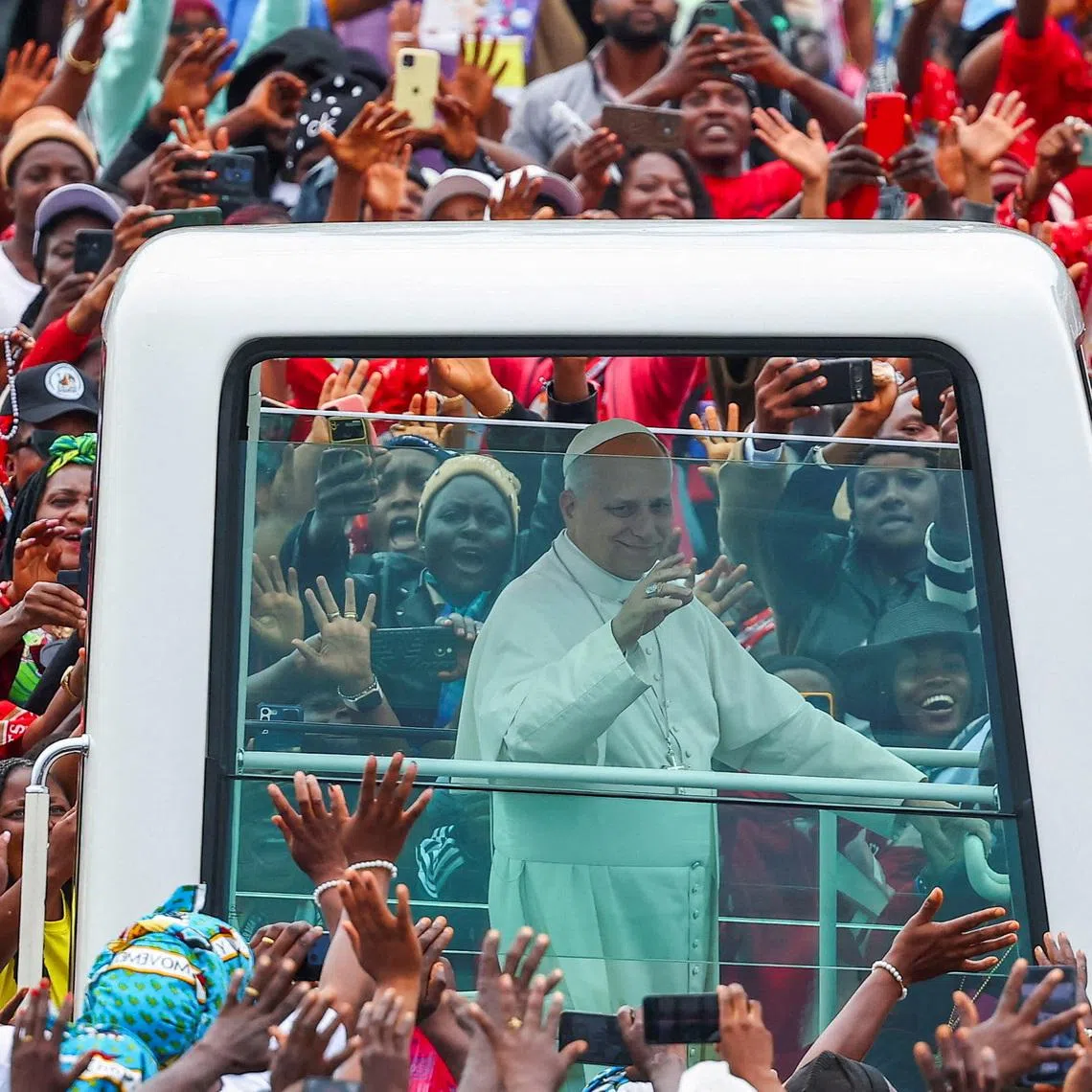 Pope Leo XIV arrives to hold a holy Mass for peace and justice at Bamenda airport in Bamenda, Cameroon, April 16, 2026. REUTERS/Guglielmo Mangiapane