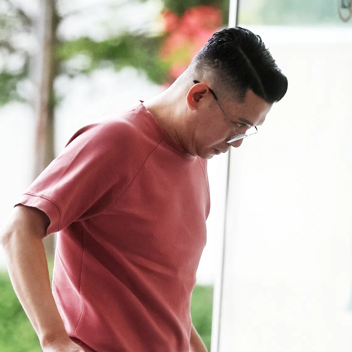 Sufandi Ahmad pleaded guilty to one count each of criminal breach of trust and using a counterfeit stamp certificate in place of a genuine one.