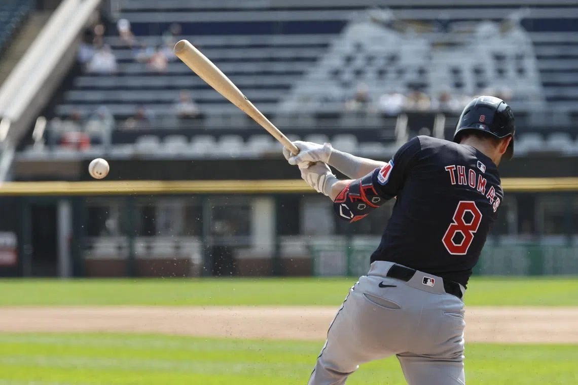 FILE PHOTO: Sep 11, 2024; Chicago, Illinois, USA; Cleveland Guardians outfielder Lane Thomas (8) hits a two-run single against the Chicago White Sox during the first inning at Guaranteed Rate Field. Mandatory Credit: Kamil Krzaczynski-Imagn Images/File Photo
