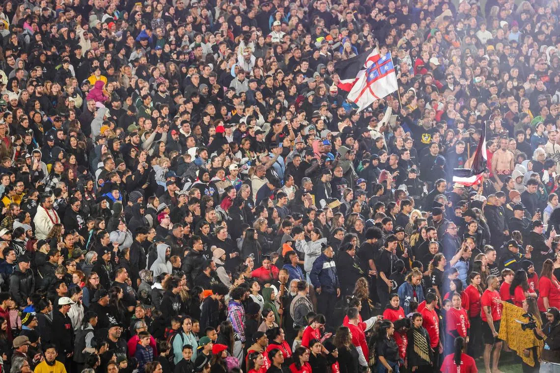 Over 6,000 people gathered at the Eden Park rugby stadium to reclaim for New Zealand the world record for the largest mass Haka.