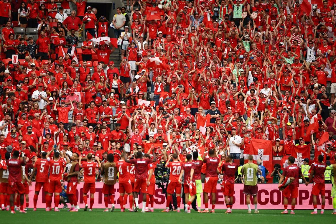 Soccer Football - FIFA World Cup 2026 - Group B - Switzerland v Canada - BC Place, Vancouver, Canada - June 24, 2026 Switzerland players celebrate after the match REUTERS/Agustin Marcarian