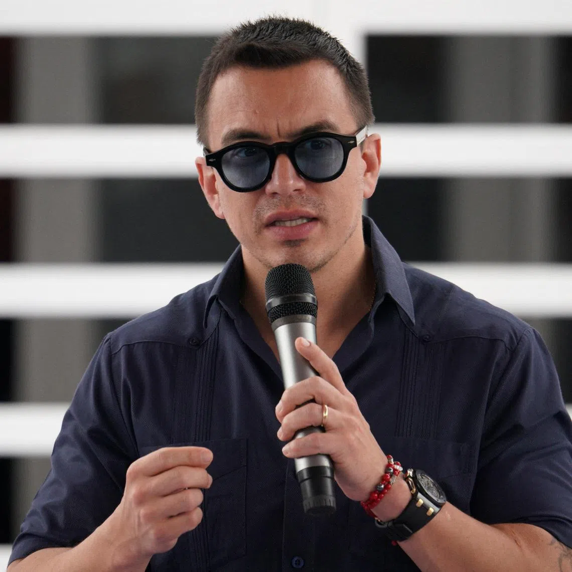 FILE PHOTO: Ecuador's President Daniel Noboa speaks at the inauguration of a child development center in a low-income neighborhood plagued by violence and organized crime on the outskirts of Guayaquil, in Duran, Ecuador, October 14, 2025. REUTERS/Santiago Arcos/File Photo