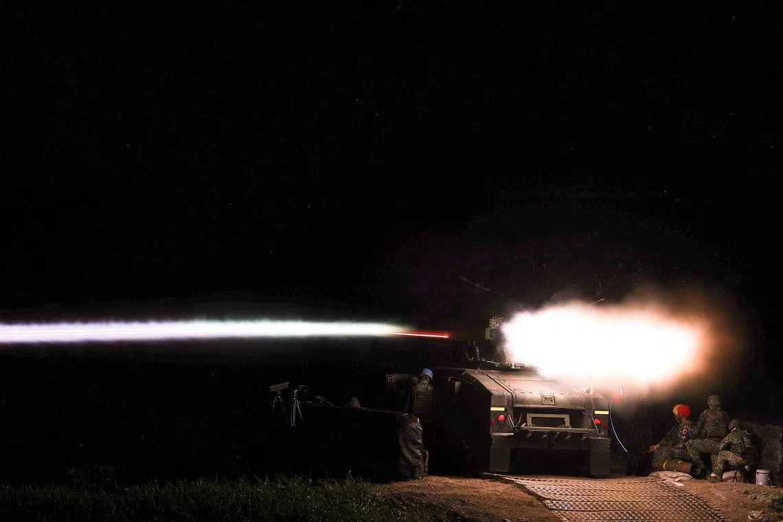 Taiwanese soldiers launching a US-made TOW 2A wire-guided anti-tank missile from an M1167 TOW carrier vehicle at the Fangshan training grounds in Pingtung, Taiwan, Aug 26, 2024. 