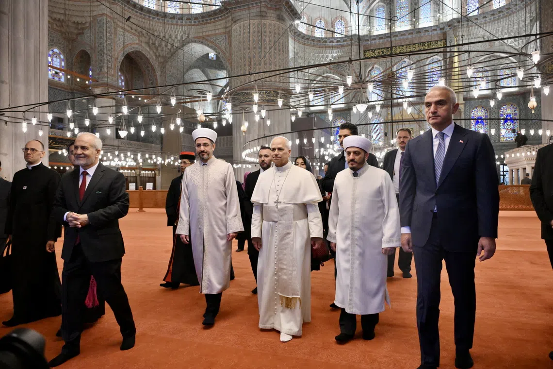 Pope Leo XIV (centre) visited Istanbul’s famed Blue Mosque early on Nov 29 on the third day of his trip to Turkey.