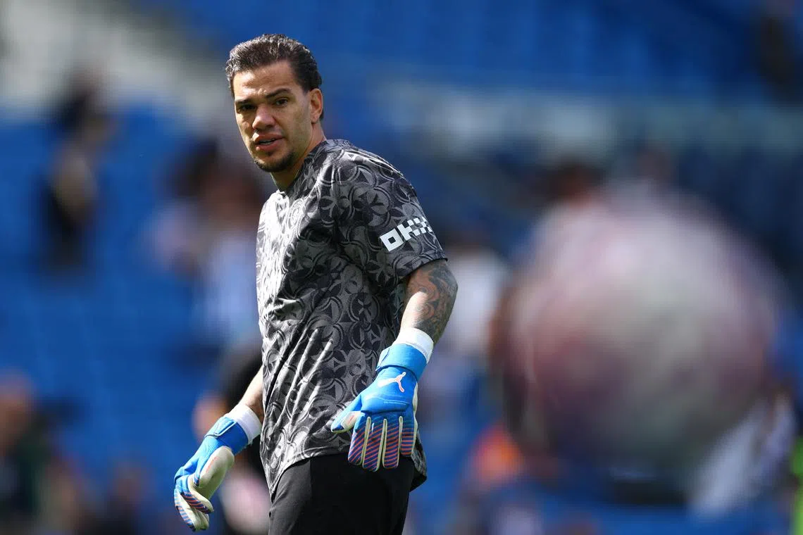 FILE PHOTO: Soccer Football - Premier League - Brighton & Hove Albion v Manchester City - The American Express Community Stadium, Brighton, Britain - August 31, 2025 Manchester City's Ederson during warm-up before the match Action Images via Reuters/Matthew Childs/File Photo