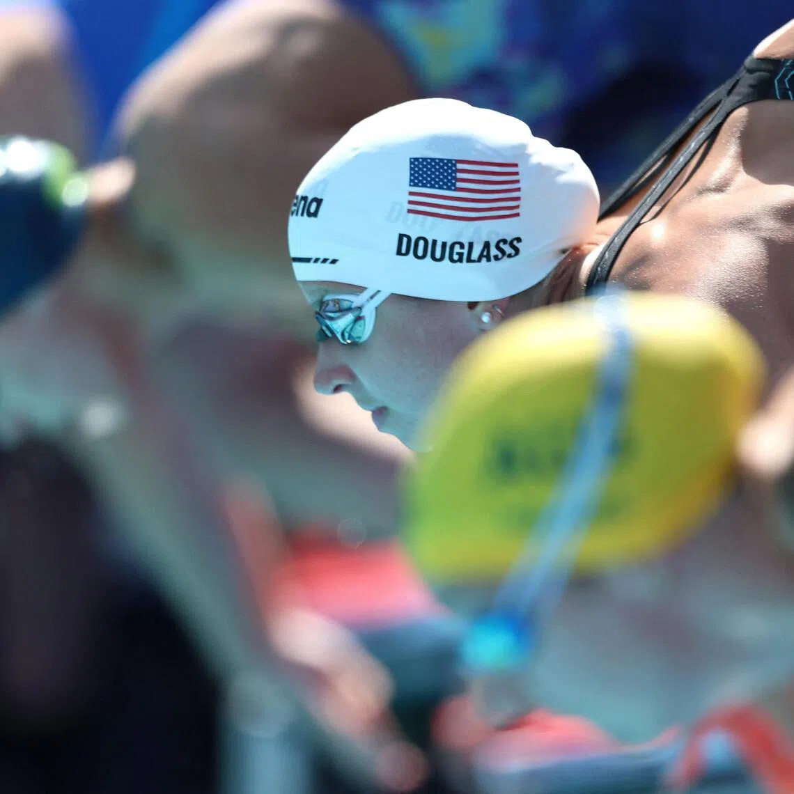 American Kate Douglass knocked three-tenths of a second off the world record of 23.49sec she set hours earlier in the heats to win the 50m freestyle in 23.19sec at the Pan Pacific Championships.