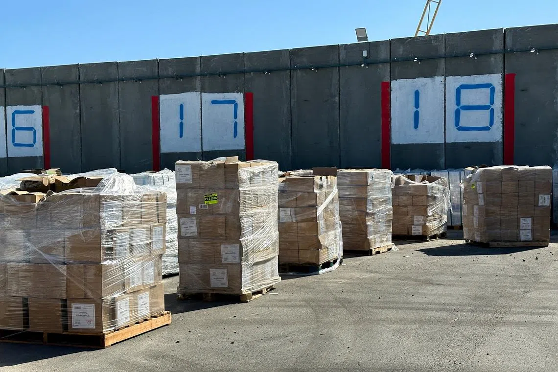 Supplies wait to be loaded on trucks to go into the Gaza Strip, at the Kerem Shalom crossing between Israel and Gaza, on its Israeli side, May 29, 2025. REUTERS/Shafiek Tassiem